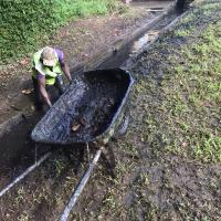 FROT Group in action during a drainage and sanitation community service exercise in Lagos
