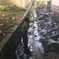 FROT Group in action during a drainage and sanitation community service exercise in Lagos